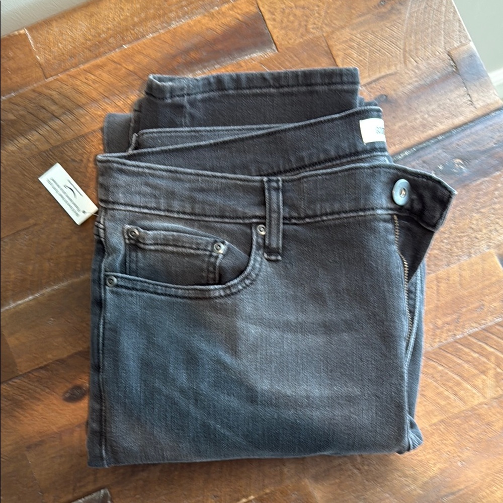 Slim Black Jeans with Subtle Distressing